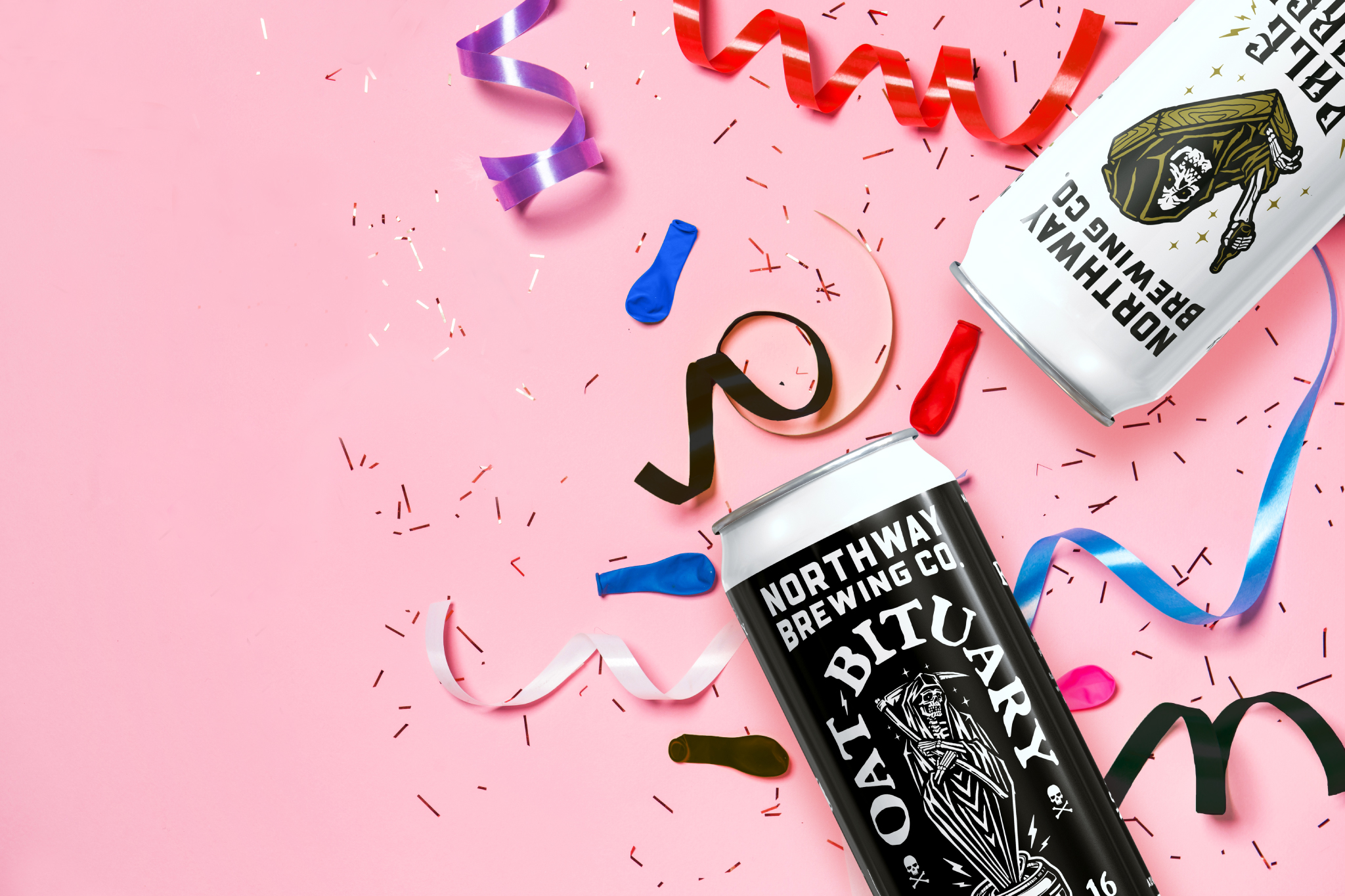 Northway Brewing Co. cans on a pink surface with confetti and deflated balloons.